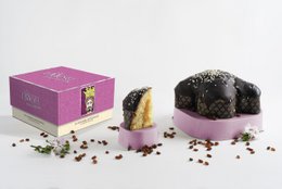  Colomba at the Sicilian passito I Moori - 1 kg, a chocolate gift item. The product features a purple box, a chocolate cake-like item, and various spices and ingredients.