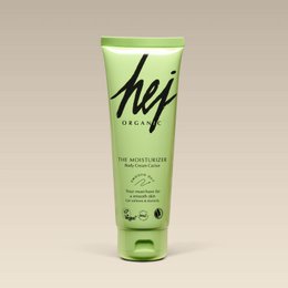 Green moisturizing body cream in 125ml tube. Hydrating formula with natural ingredients.