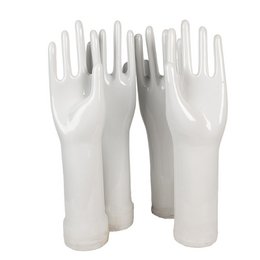  A pair of white latex gloves used for decoration or crafting purposes. The gloves have a textured surface and are made of a durable, flexible material.