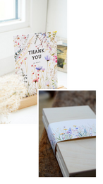  Wooden flowerbox containing colorful dried flowers and petals.