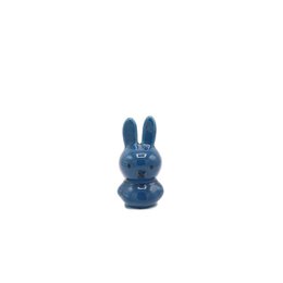  Blue ceramic figurine of a rabbit or bunny with a simple, minimalist design.