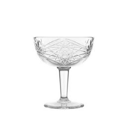 Elegant crystal cocktail glass with intricate star-shaped pattern, suitable for serving a variety of cocktails.