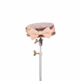 Children's rose quartz knitted bow tie, a delicate and stylish accessory for any occasion. Featuring a soft, knitted texture and a subtle rose quartz color, this bow tie is perfect for adding a touch of elegance to any outfit.