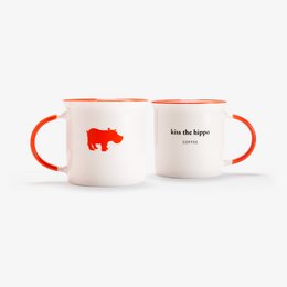 Everyday ceramic mug with red rhino logo and text "kiss the hippo" printed on it. The mug is white in color with a red handle and rim.