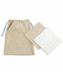 Reusable makeup remover squares made of soft, natural cotton. Includes a drawstring storage bag.