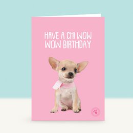  Adorable Chihuahua puppy on a pink birthday card with the text "Have a Chihuahua wow birthday". The card features a cute Chihuahua wearing a pink bow tie and sitting on a pink background with heart shapes.