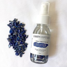 Intuition and Lapis Lazuli vibratory spray, a room spray with a blue-colored lapis lazuli crystal inside the bottle.