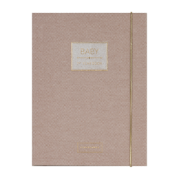  A soft, neutral-colored baby's first year book with a luxe, minimalist design. The book cover features a simple label and is made of a warm, textured material.