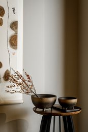 Large modern ceramic bowl in earthy tones, suitable for serving or display.
