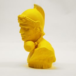 Yellow Roman-style statue with a futuristic, techno-inspired design.