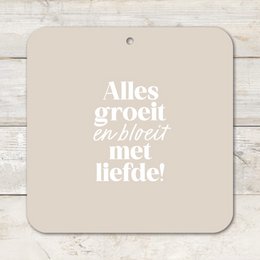  Decorative magnet with the word "LOVE" in bold black text on a white background.