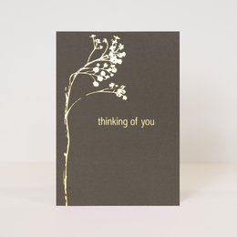 Elegant gold foil floral postcard with the text "thinking of you" on a dark gray background.
meta_keywords: postcard, greeting card, floral, gold foil, thinking of you