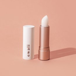 A white and rose gold lip balm with a smooth, creamy texture that provides hydration and nourishment for the lips.