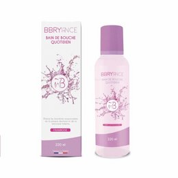 Raspberry-flavored mouthwash in a purple bottle with floral design. Contains ingredients to help freshen breath and promote oral hygiene.