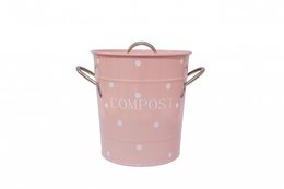  A round, pink compost bin with white polka dots, measuring 21x19 cm, suitable for waste disposal.