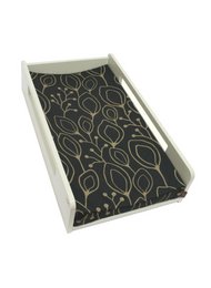 Rectangular changing pad in pale blue, sand, and anthracite colors with a modern abstract pattern.