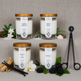  Four white soy wax scented candles with gold lids, wick trimmer, floral and botanical scents, gift set.