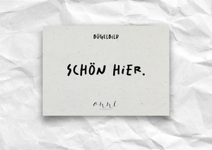 Opstrijkafbeelding "Mooi hier." – DTF-overdracht, zwart/wit