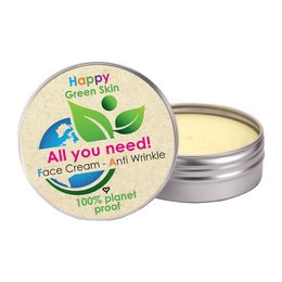 All you need! Anti-wrinkle face cream with 100% organic prickly pear seed oil. Cream in a round container with green leaf design.
