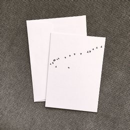 Folding Christmas card featuring a flock of birds flying in a line across the image.