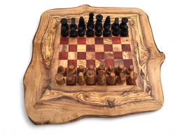  Handmade olive wood chess game with a rustic, natural design. The chessboard features a classic checkered pattern and the chess pieces are made of dark wood, creating a visually appealing contrast.