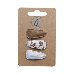  Set of 4 brown and white hair clips with floral and pearl accents. Suitable for everyday wear or special occasions.