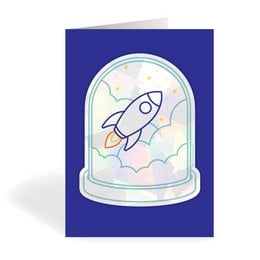 Colorful rocket-shaped window sticker or card with a rocket ship inside a glass dome against a starry background.