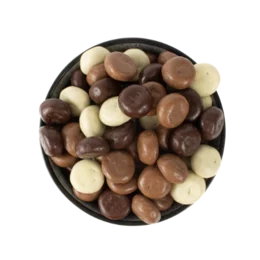 Assorted chocolate-covered nuts and gingerbread pieces in a bowl. Includes a variety of shapes, sizes, and colors such as round, oval, and irregular shapes in dark chocolate, milk chocolate, and white chocolate coatings.