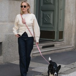  Pink and cream multifunction dog leash, adjustable length, stylish pet accessory for small to medium dogs.