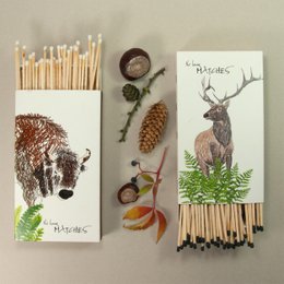 Long matches with a deer illustration on the box. The matches are part of the "Nature" series and feature a detailed drawing of a deer standing in a forest setting.