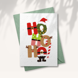 A festive Christmas card with the text "Ho Ho Ho" and illustrations of Santa Claus, reindeer, and other holiday elements.