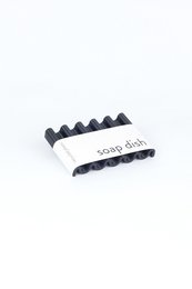 Recycled PET soap dish in sepia black onda design. Made from sustainable materials, this soap dish features a wavy, textured surface for a modern, minimalist look.