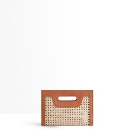 Caramel-colored leather clutch with perforated pattern and wooden handles.