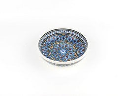 Decorative ceramic bowl with intricate floral and geometric patterns in vibrant colors.