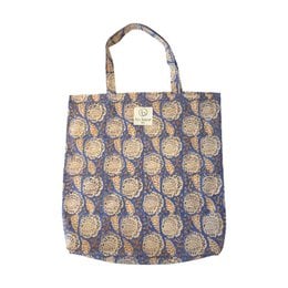 "Floral printed cotton tote bag N°121 - A stylish and versatile shopping bag featuring a vibrant floral print in shades of blue, green, and pink. The cotton material is durable and easy to clean."
The image shows a floral printed cotton tote bag. The bag has a vibrant floral pattern in shades of blue, green, and pink. The pattern features various flowers and leaves, creating a visually appealing and stylish design. The bag appears to be made of a durable cotton material, making it suitable for everyday use as a shopping bag.