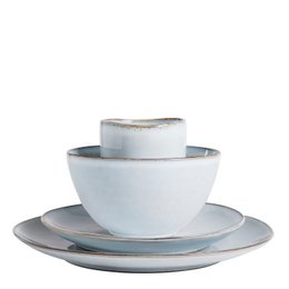 A set of 4 gray ceramic dinner plates, bowls, and cups. The dinnerware has a simple, minimalist design with a matte finish.