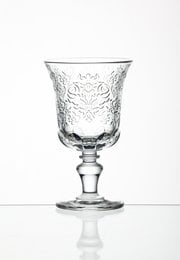 Set of 6 clear glass wine glasses with intricate floral pattern design. Elegant stemware for wine tasting or formal dining.