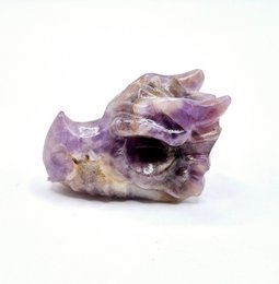  Amethyst dragon skull crystal, 4 cm in size, with a unique and natural shape featuring vibrant purple and white colors.