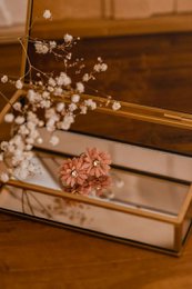  Pink rubber hair ties with floral accents, suitable for kids' hairstyles.