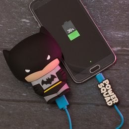Portable power bank with Batman design, suitable for charging smartphones. Features a stylized Batman logo and character design.