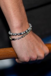  Stainless steel bracelet with a chain design, available in multiple wrist sizes from XS to XXL.