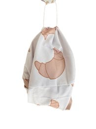  Beige and white headband with abstract shapes, suitable for children.