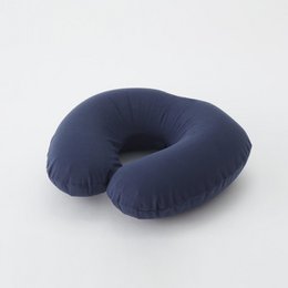  Navy blue neck pillow with a round, donut-shaped design for comfort and support.