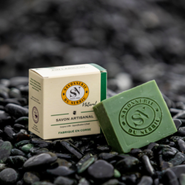 Handmade natural soap bar with pine scent, made from natural ingredients.