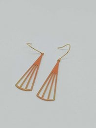 Orange enamel drop earrings with a gold-tone metal frame and a fan-like shape.