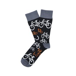 Black socks with a repeating pattern of white bicycles and orange accents. The socks appear to be made of a soft, stretchy material and have a comfortable, casual style.