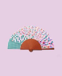 Vibrant, handmade Spanish fan with a colorful, patterned design featuring gingham, polka dots, and abstract shapes.