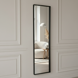  A tall, rectangular black metal framed mirror measuring 30x120 cm, suitable for wall mounting in a living room or bedroom.