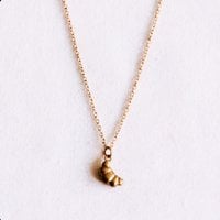 Fijne ketting met een mini-croissant