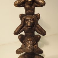 Tower monkeys see hear speak no evil